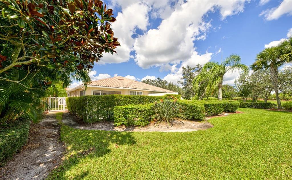 3405 Hyperion Way Southeast Palm Bay, FL 32909 - Photo 11 of 17 a view of a garden with an trees