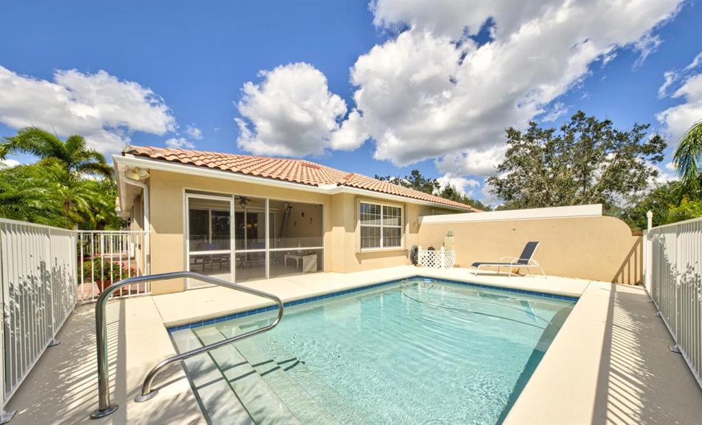 3405 Hyperion Way Southeast Palm Bay, FL 32909 - Photo 2 of 17 a view of a house with backyard and sitting area