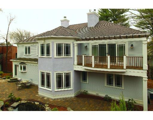 66 Mason Terrace Brookline, MA 02446 - Photo 12 of 13 a front view of a house with a yard