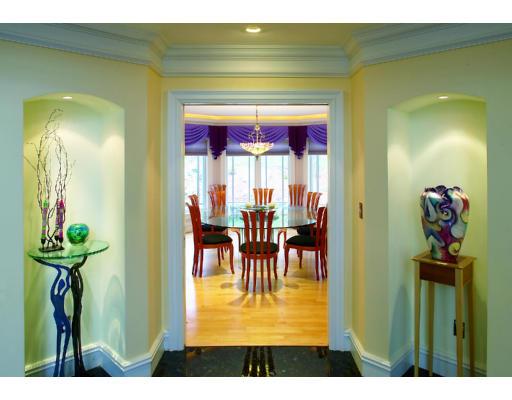 66 Mason Terrace Brookline, MA 02446 - Photo 6 of 13 a view of a dining room with furniture and a chandelier