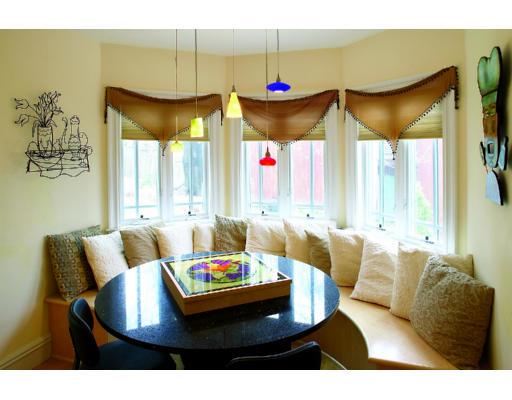 66 Mason Terrace Brookline, MA 02446 - Photo 8 of 13 a living room with furniture and a large window