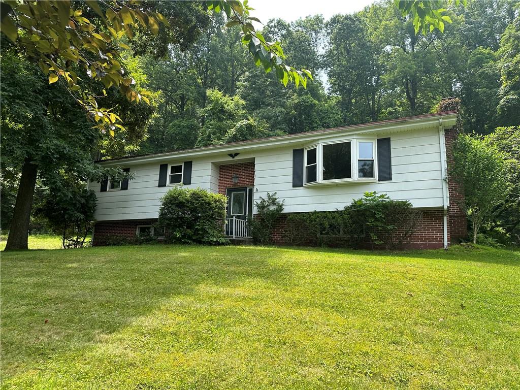 245 T700 Indiana, PA 15701 - Photo 1 of 15 a view of a house with a yard and potted plants