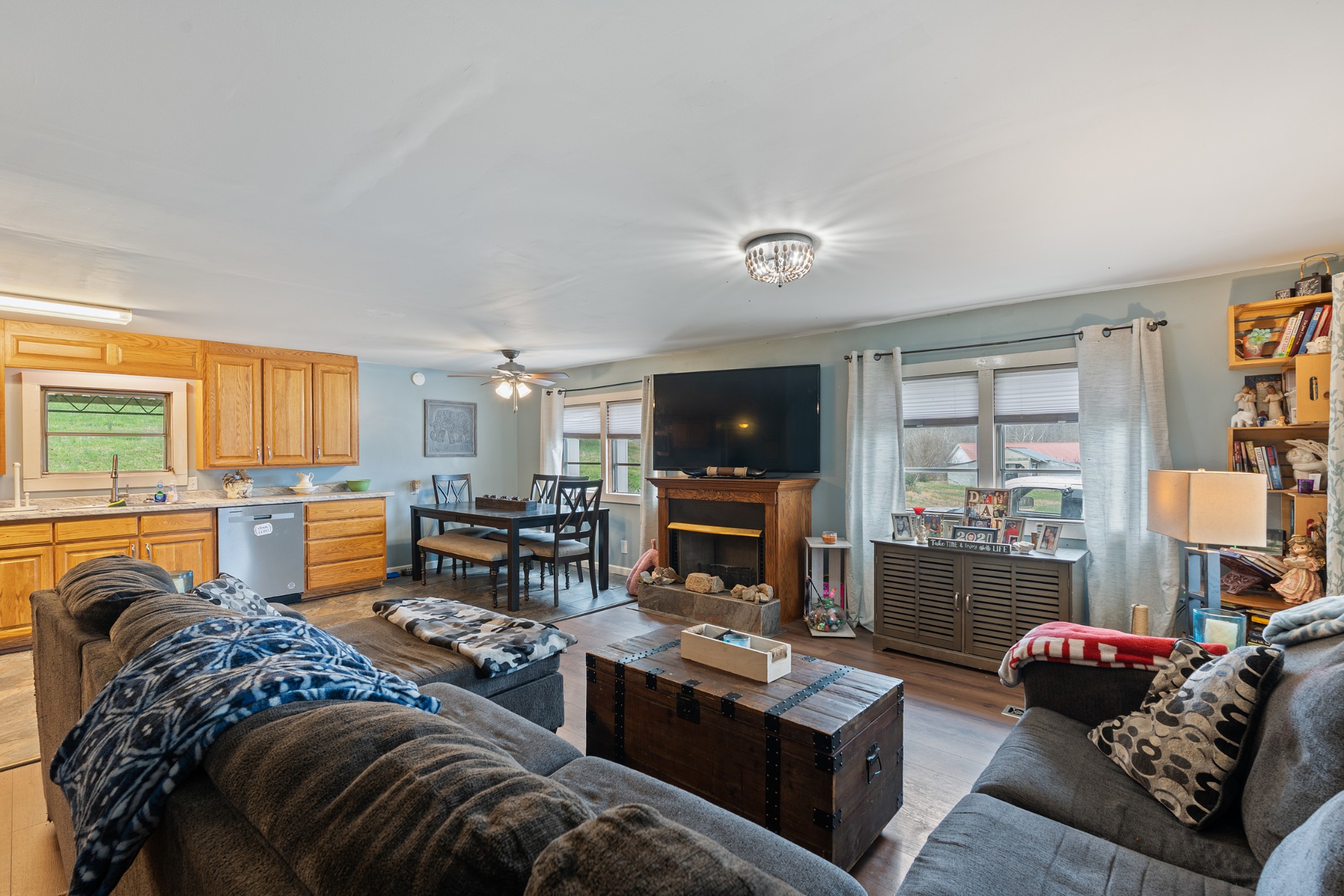 121 Deer Creek Road McEwen, TN 37101 - Photo 19 of 35 a living room with furniture fireplace and a flat screen tv