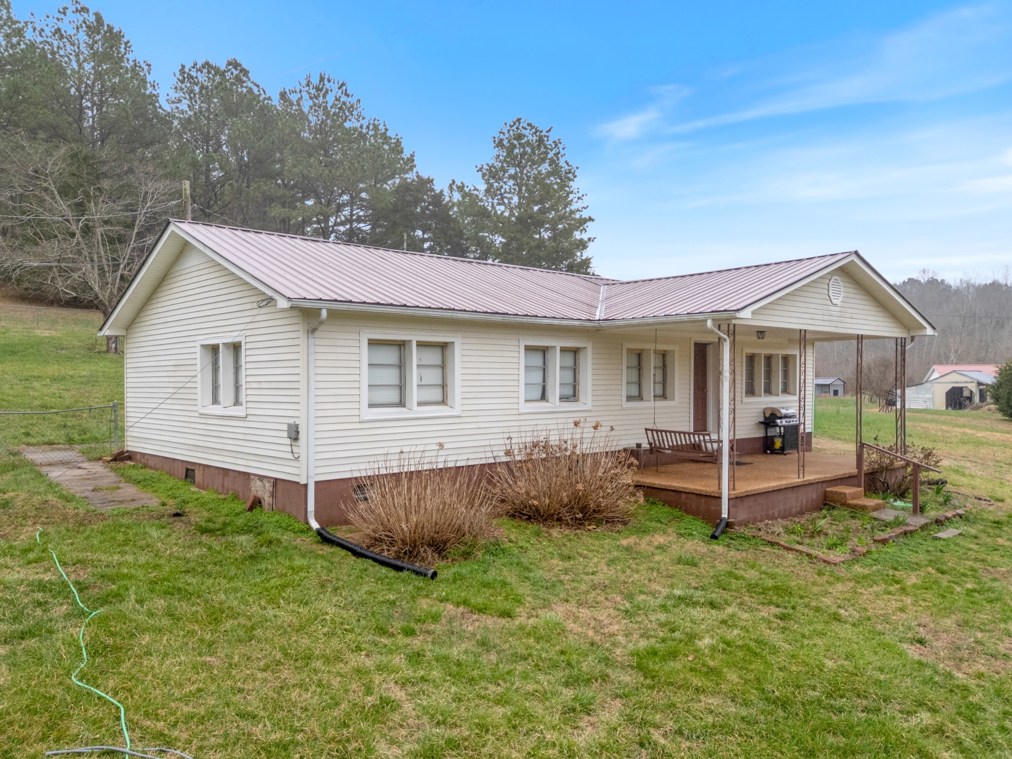 121 Deer Creek Road McEwen, TN 37101 - Photo 2 of 35 a view of a house with a yard and sitting area