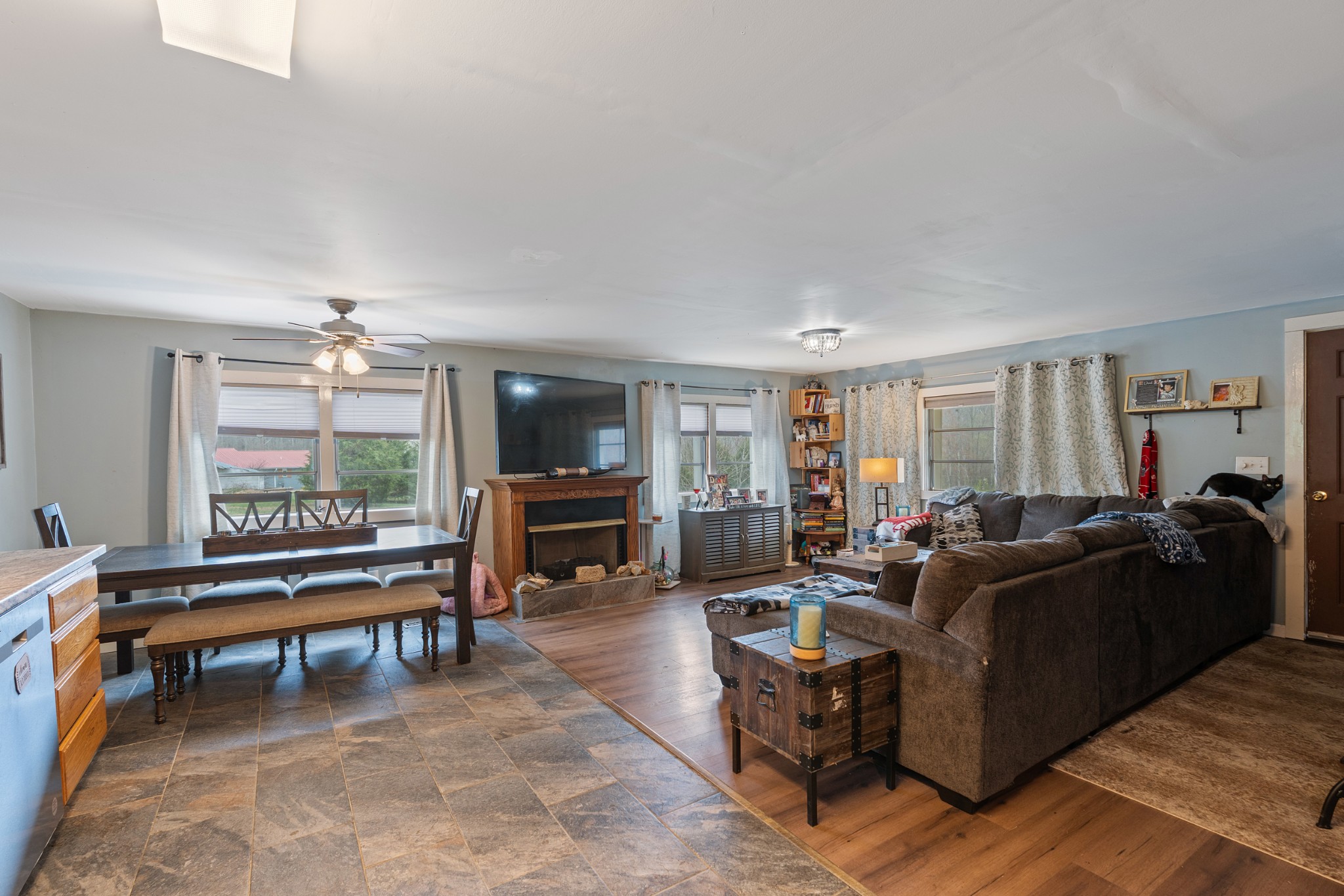 121 Deer Creek Road McEwen, TN 37101 - Photo 25 of 35 a living room with furniture a piano and a fireplace