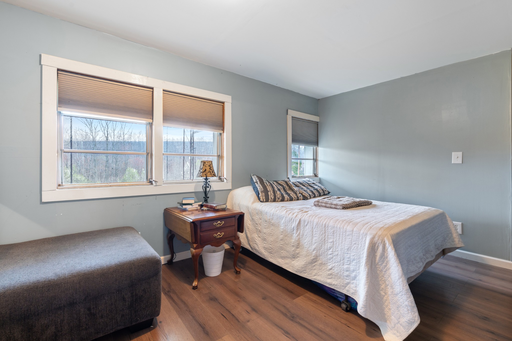 121 Deer Creek Road McEwen, TN 37101 - Photo 26 of 35 a bedroom with a bed and windows