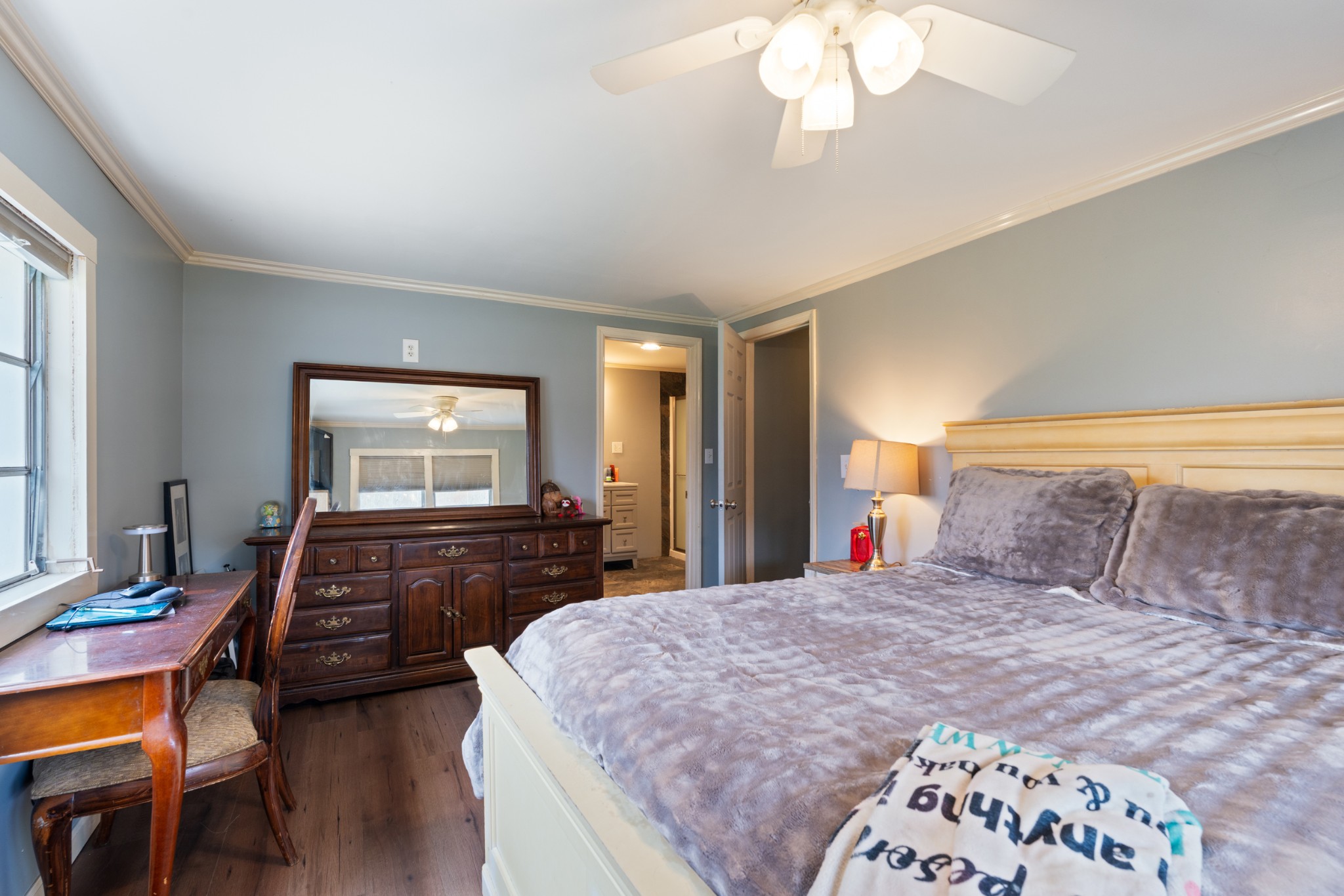 121 Deer Creek Road McEwen, TN 37101 - Photo 28 of 35 a bedroom with a bed and a dresser