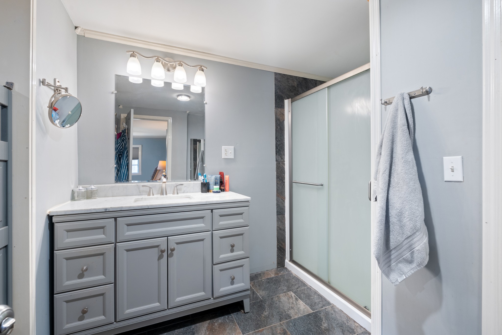 121 Deer Creek Road McEwen, TN 37101 - Photo 30 of 35 a bathroom with a double vanity sink mirror and cabinets