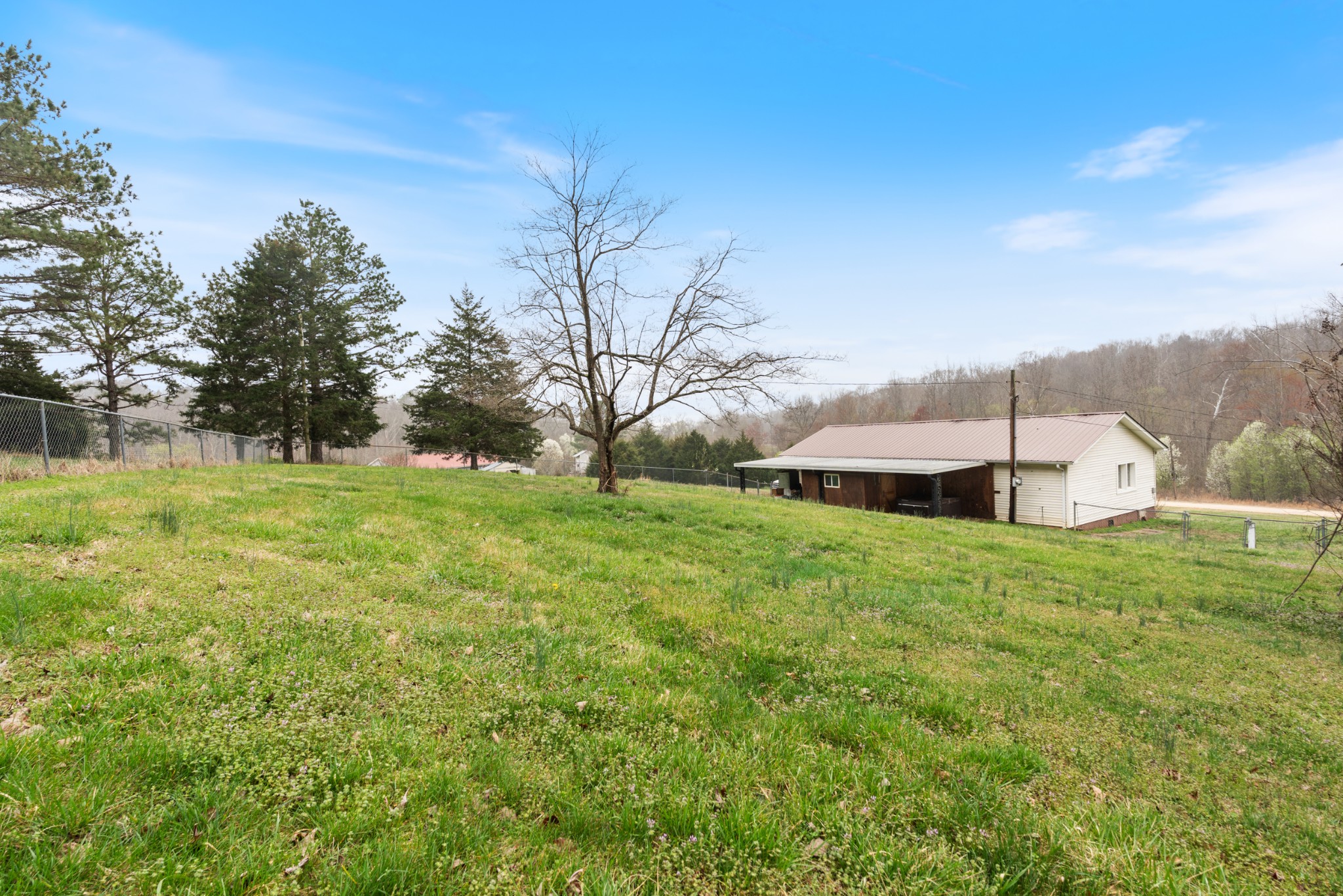 121 Deer Creek Road McEwen, TN 37101 - Photo 6 of 35 a view of a house with a yard