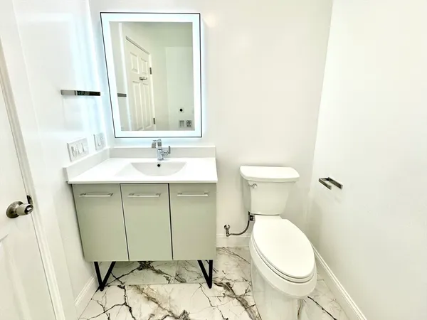 a bathroom with a sink and a toilet