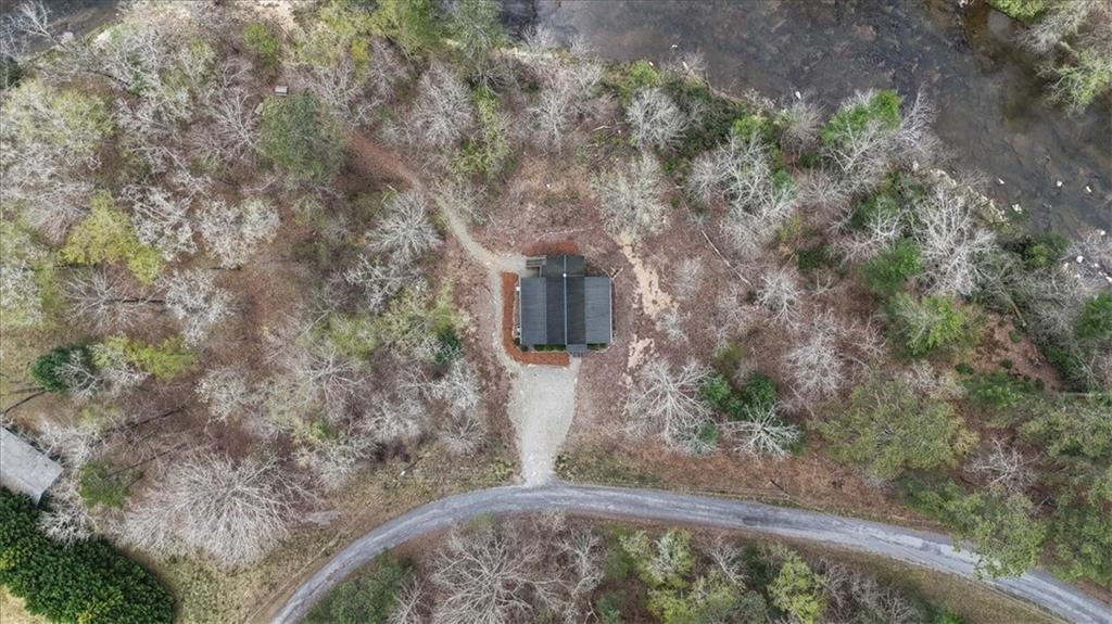496 Meadow Lane Talking Rock, GA 30175 - Photo 2 of 62 a view of a backyard with pathway