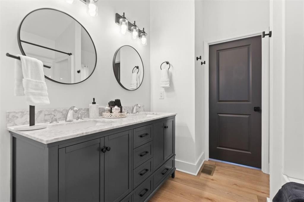 496 Meadow Lane Talking Rock, GA 30175 - Photo 28 of 62 a bathroom with a sink and a mirror