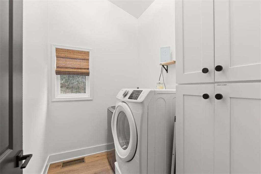 496 Meadow Lane Talking Rock, GA 30175 - Photo 34 of 62 a utility room with dryer and washer