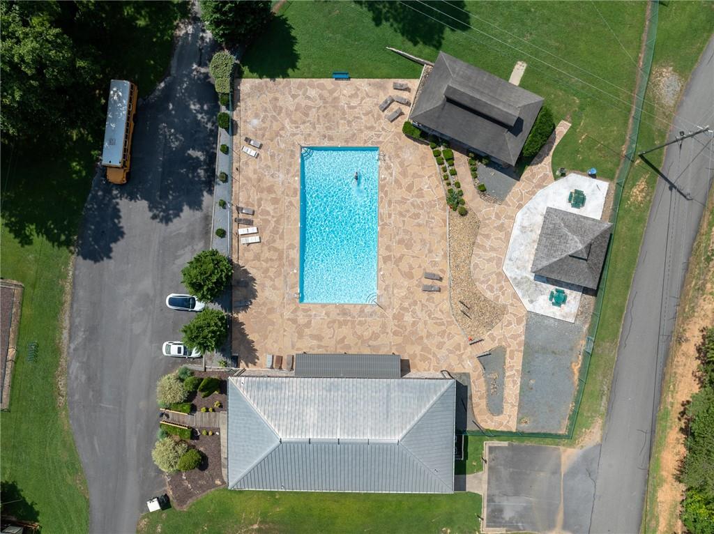 496 Meadow Lane Talking Rock, GA 30175 - Photo 52 of 62 an aerial view of a house with a swimming pool