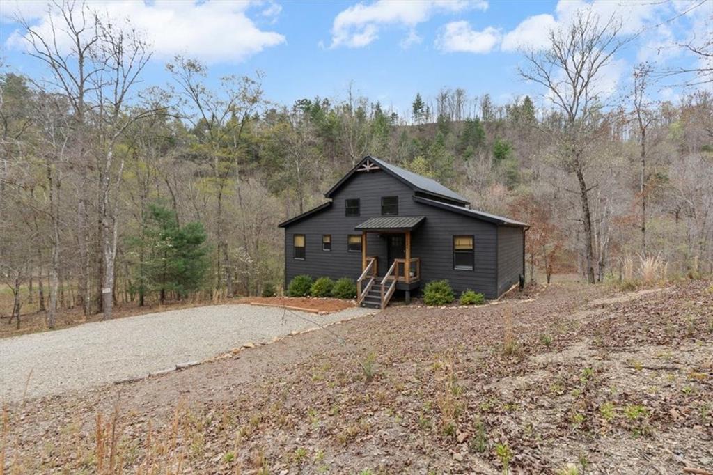 496 Meadow Lane Talking Rock, GA 30175 - Photo 10 of 62 a view of a house with a yard