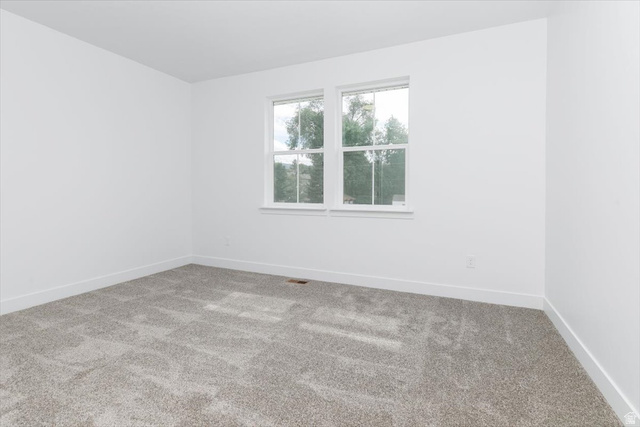 314 North 200 West Logan, UT 84321 - Photo 22 of 37 Unfurnished room featuring carpet floors and baseboards