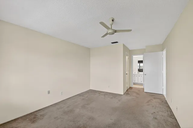 a view of a livingroom with a ceiling fan