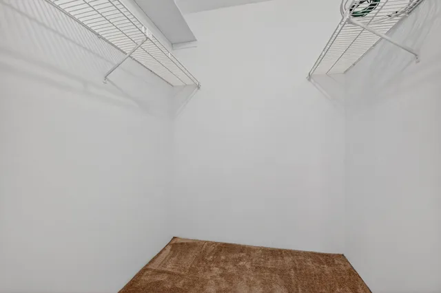 a view of small space with racks on the wall