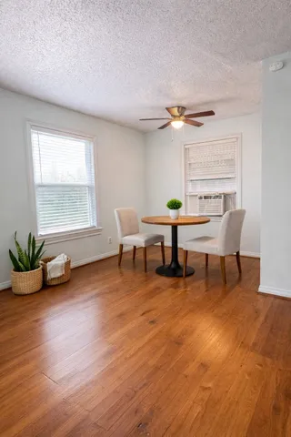 a view of a livingroom with furniture and window