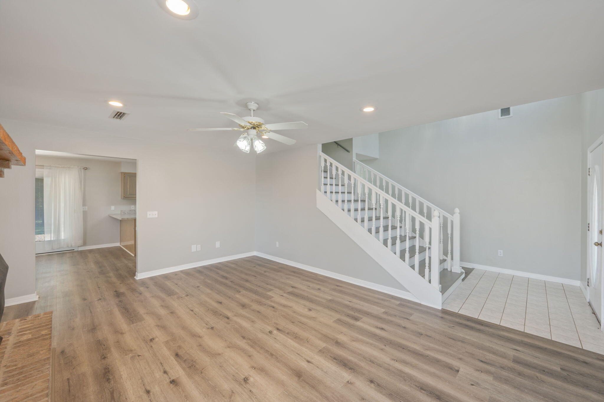 1136 10 Lake Drive DeFuniak Springs, FL 32433 - Photo 12 of 53 a view of an empty room with wooden floor