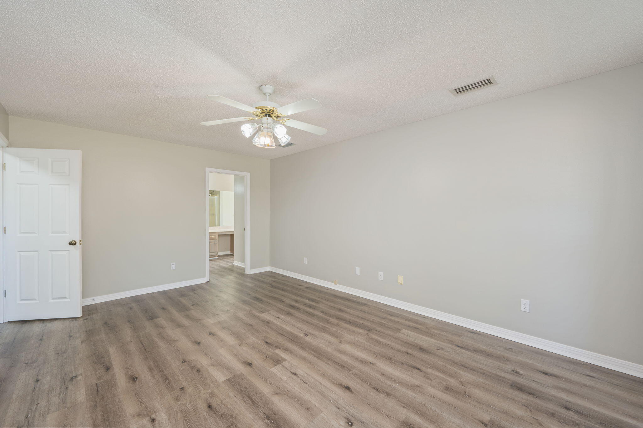 1136 10 Lake Drive DeFuniak Springs, FL 32433 - Photo 21 of 53 a view of an empty room with a window