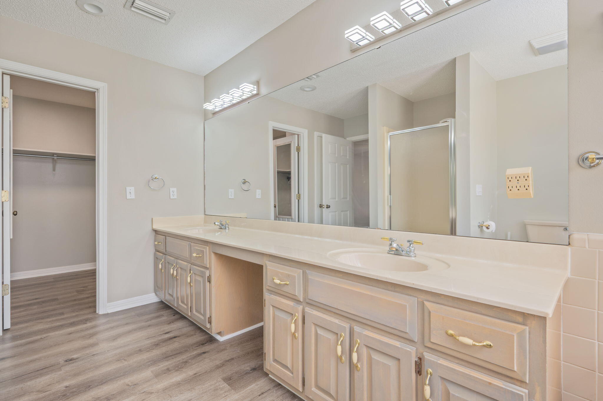 1136 10 Lake Drive DeFuniak Springs, FL 32433 - Photo 23 of 53 a bathroom with a double vanity sink mirror and