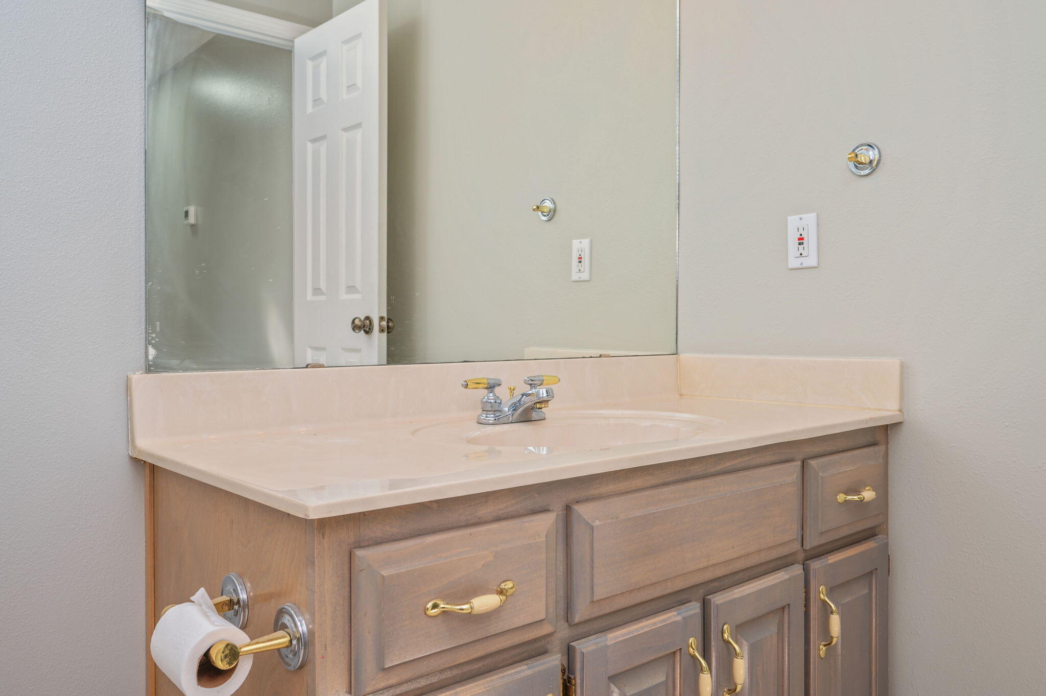 1136 10 Lake Drive DeFuniak Springs, FL 32433 - Photo 28 of 53 a bathroom with a sink vanity and a mirror