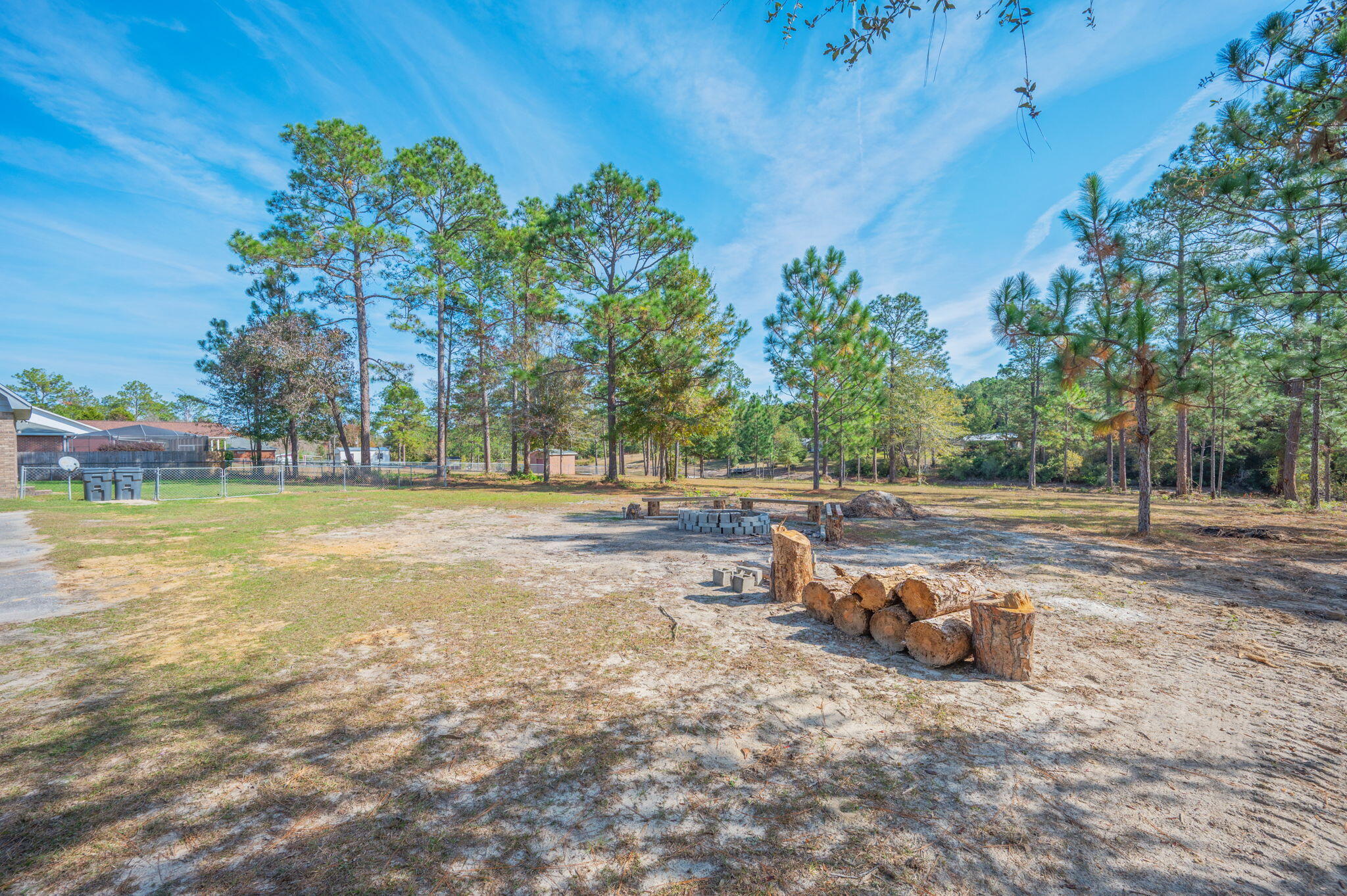 1136 10 Lake Drive DeFuniak Springs, FL 32433 - Photo 44 of 53 a view of backyard with swimming pool and seating space
