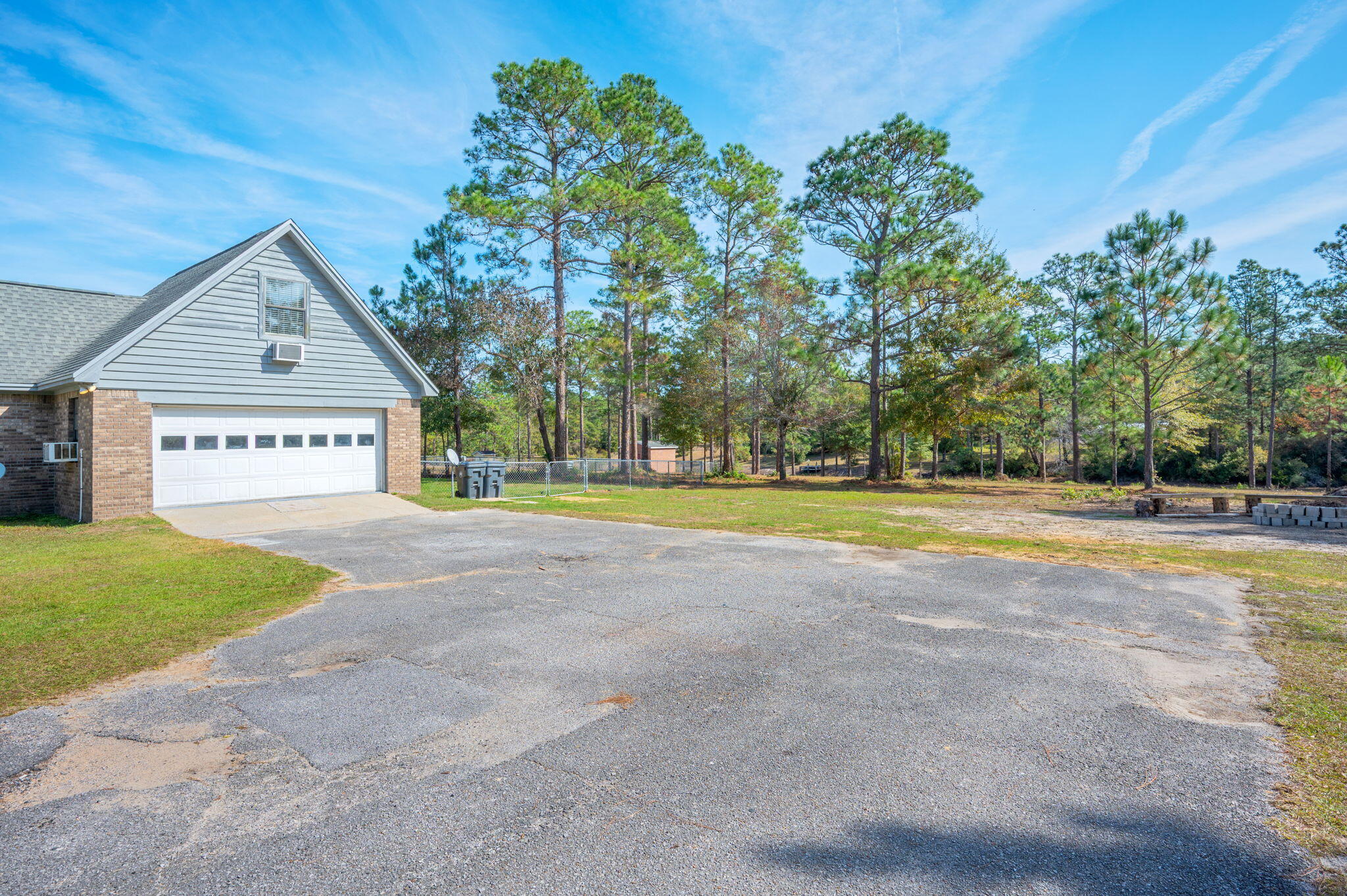 1136 10 Lake Drive DeFuniak Springs, FL 32433 - Photo 45 of 53 a view of swimming pool with tree in the background
