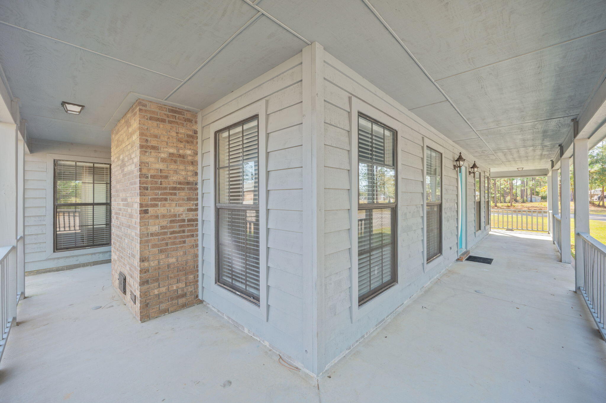 1136 10 Lake Drive DeFuniak Springs, FL 32433 - Photo 6 of 53 a view of an empty room with a window