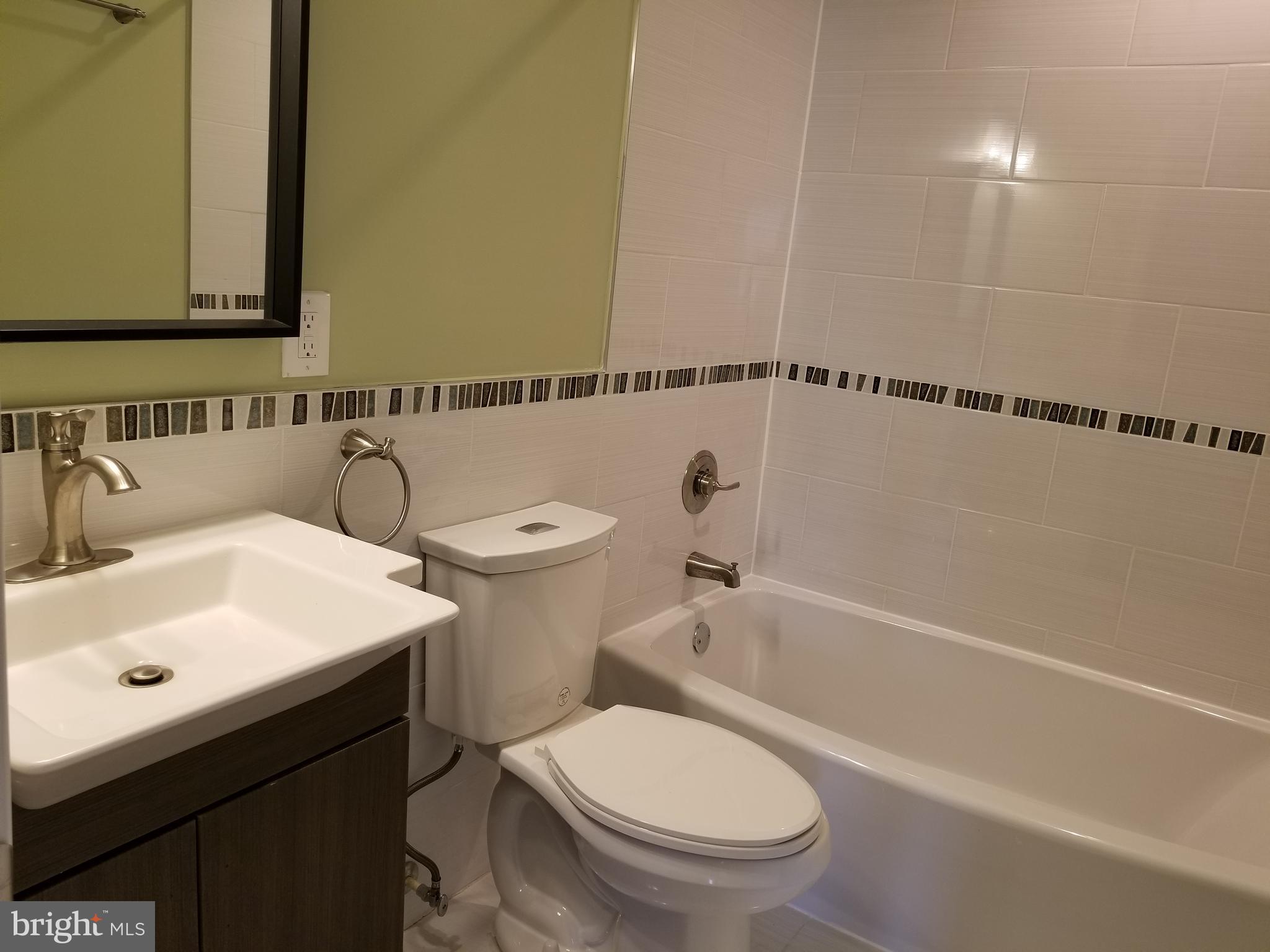 5535 Sheriff Road Fairmount Heights, MD 20743 - Photo 19 of 29 UPPER-LEVEL HALL BATHROOM