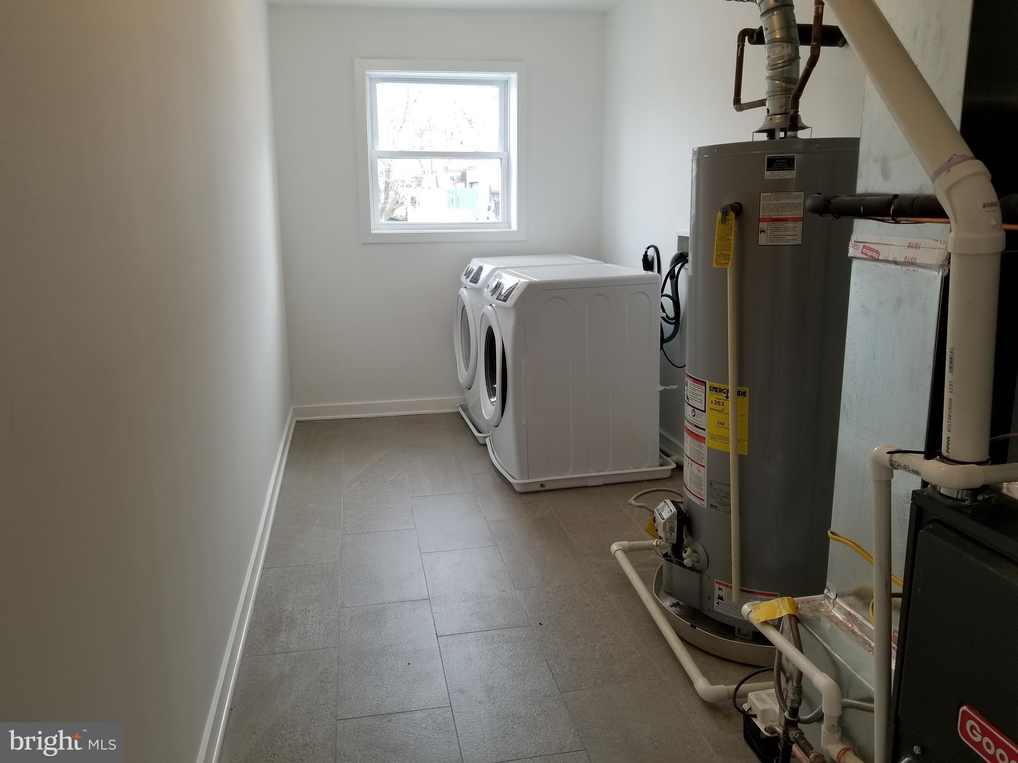 5535 Sheriff Road Fairmount Heights, MD 20743 - Photo 28 of 29 UPPER -LEVEL LAUNDRY ROOM