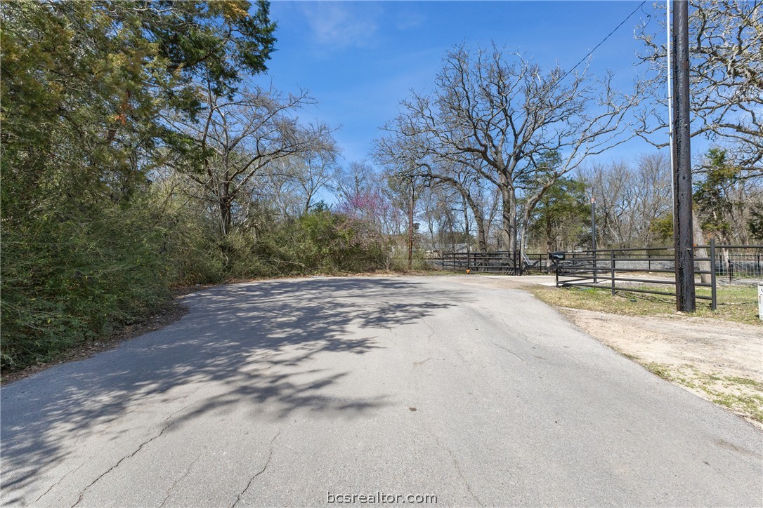 402 Wallace Street Bryan, TX 77803 - Photo 2 of 15 a view of road with with trees