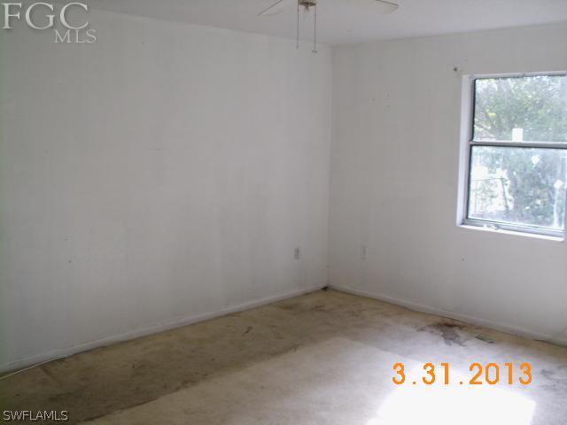 1614 Providence Road Lakeland, FL 33805 - Photo 11 of 13 an empty room with a window