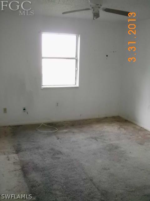 1614 Providence Road Lakeland, FL 33805 - Photo 7 of 13 an empty room with a window