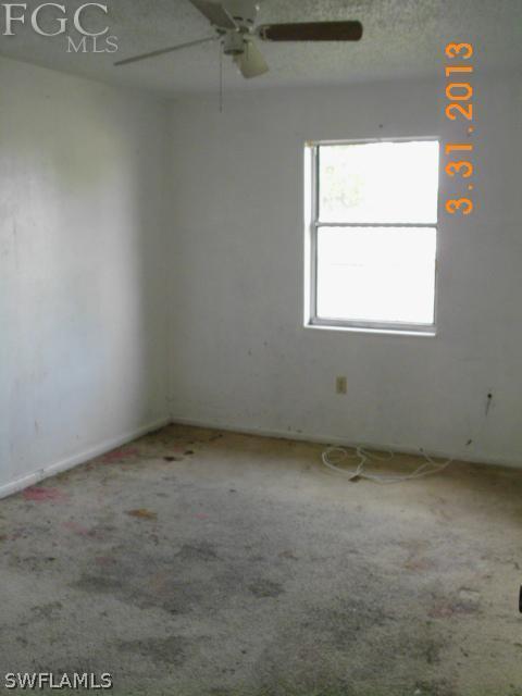 1614 Providence Road Lakeland, FL 33805 - Photo 8 of 13 an empty room with a window