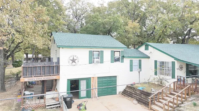 a aerial view of a house with a table and chairs