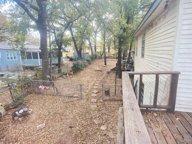 a view of a livingroom with furniture and window