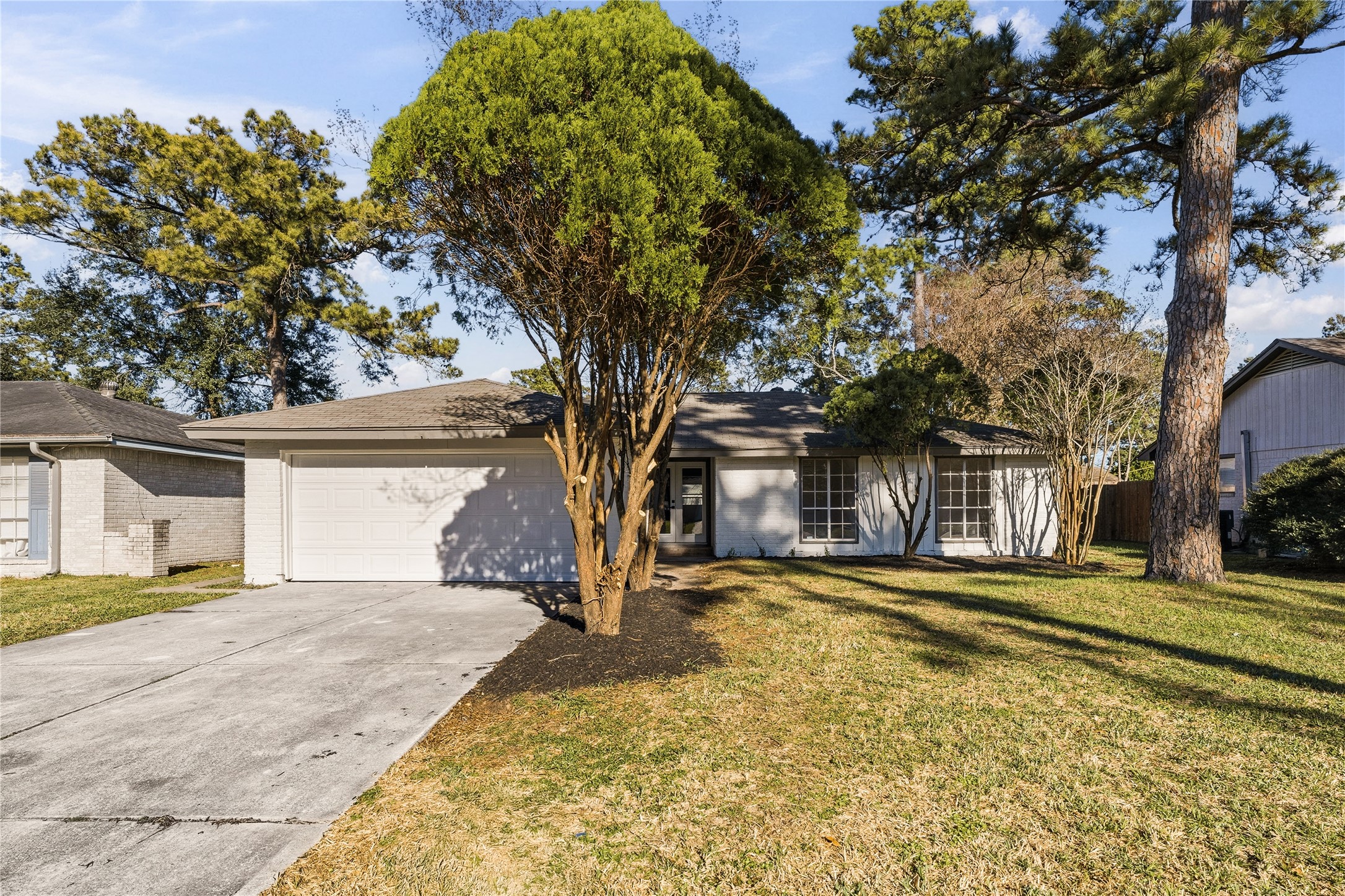 front view of a house with a yard