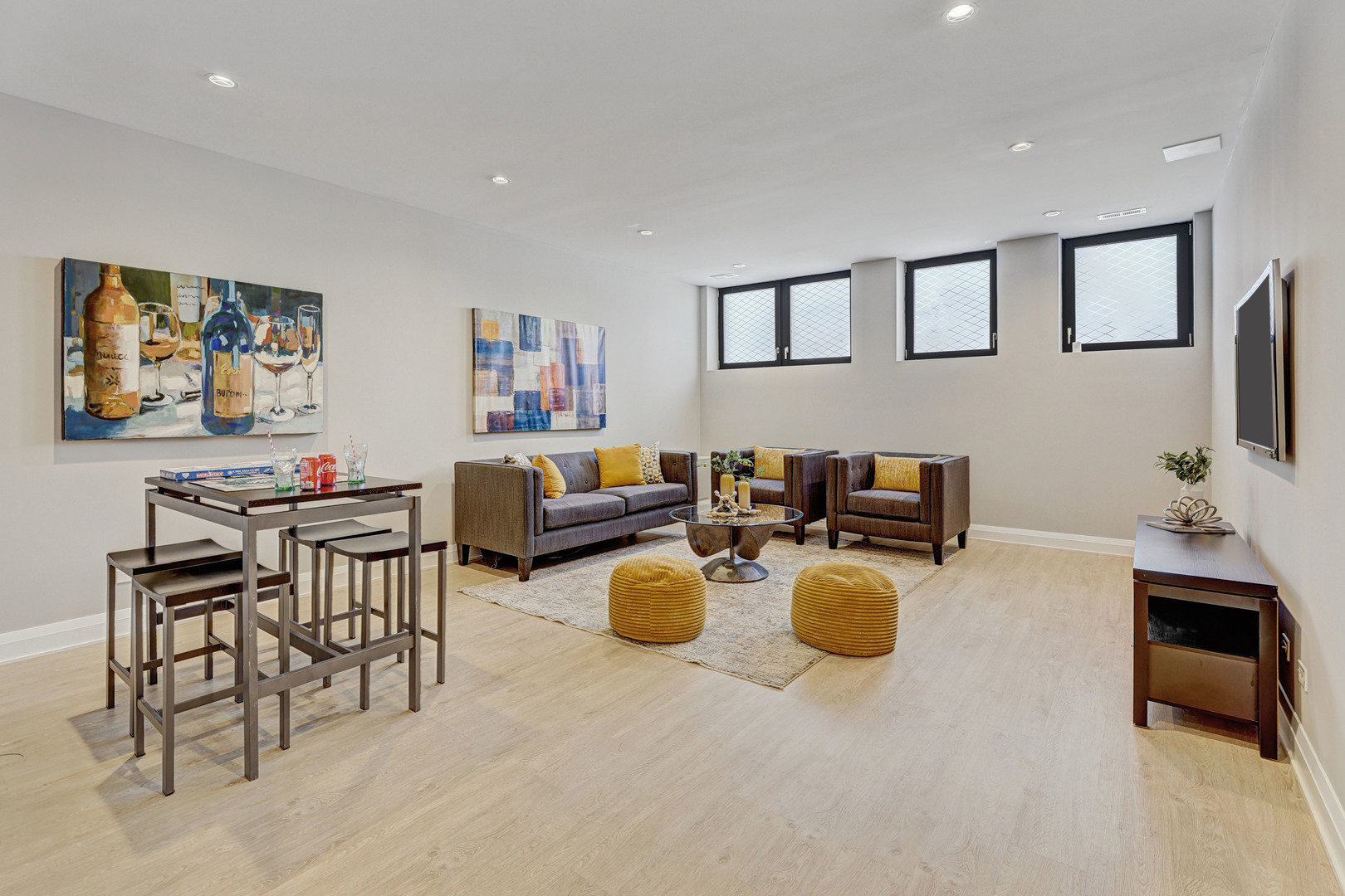3406 North Keating Avenue Chicago, IL 60641 - Photo 11 of 30 a living room with furniture and a flat screen tv