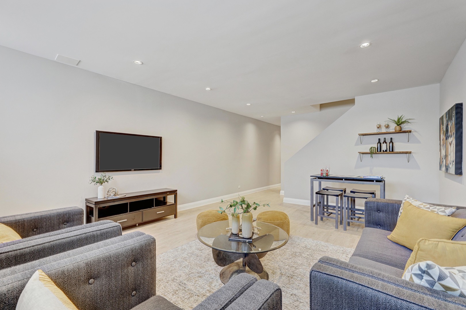 3406 North Keating Avenue Chicago, IL 60641 - Photo 13 of 30 a living room with furniture and a flat screen tv