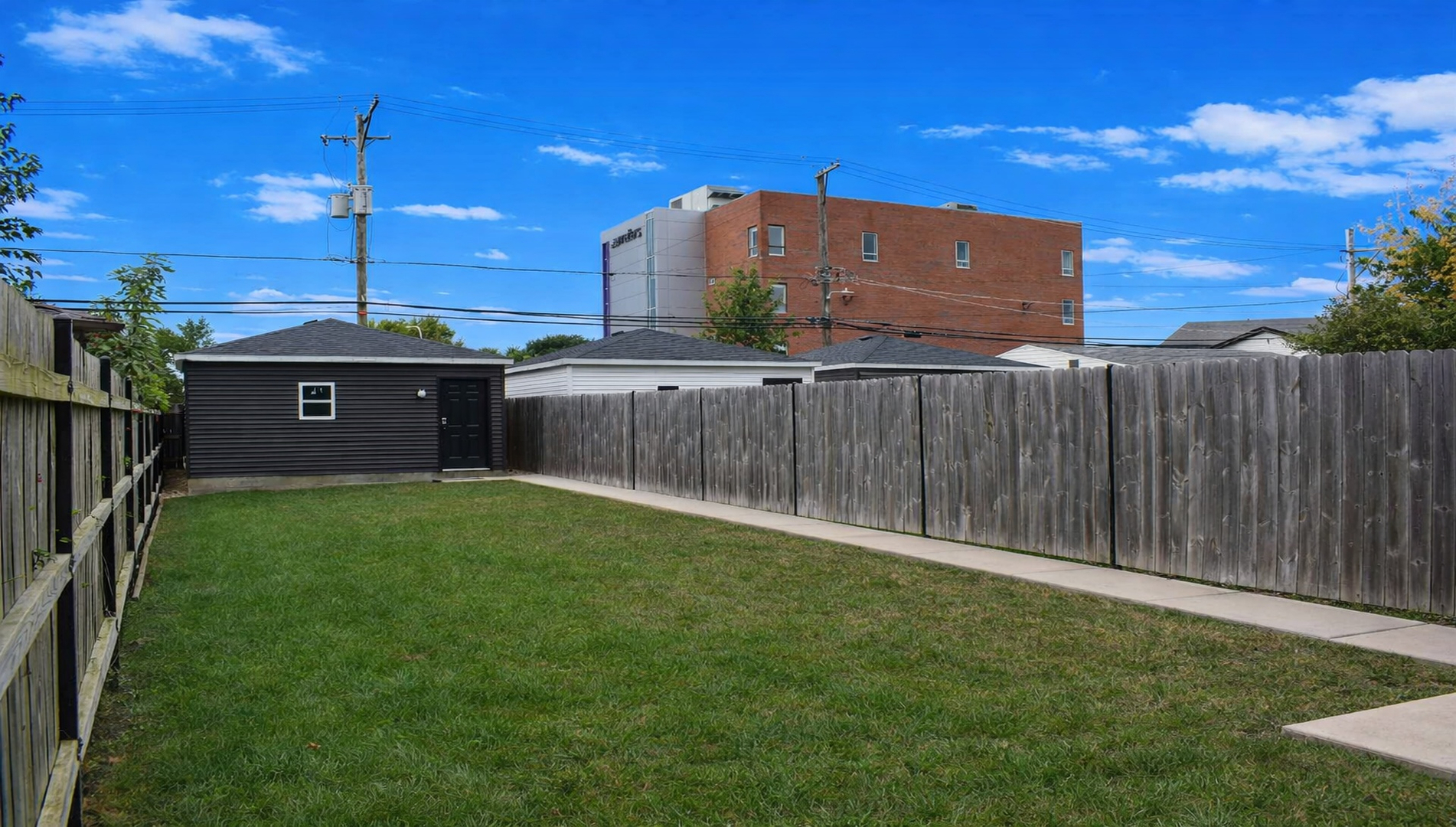 3406 North Keating Avenue Chicago, IL 60641 - Photo 15 of 30 a view of a tiny house with a outdoor space