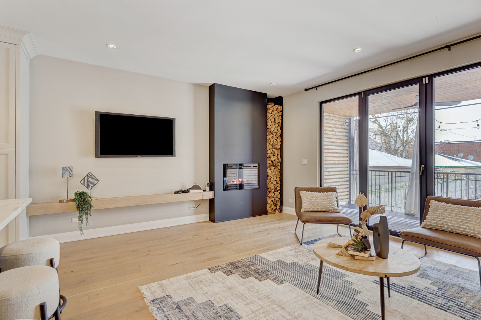 3406 North Keating Avenue Chicago, IL 60641 - Photo 6 of 30 a living room with furniture and a flat screen tv