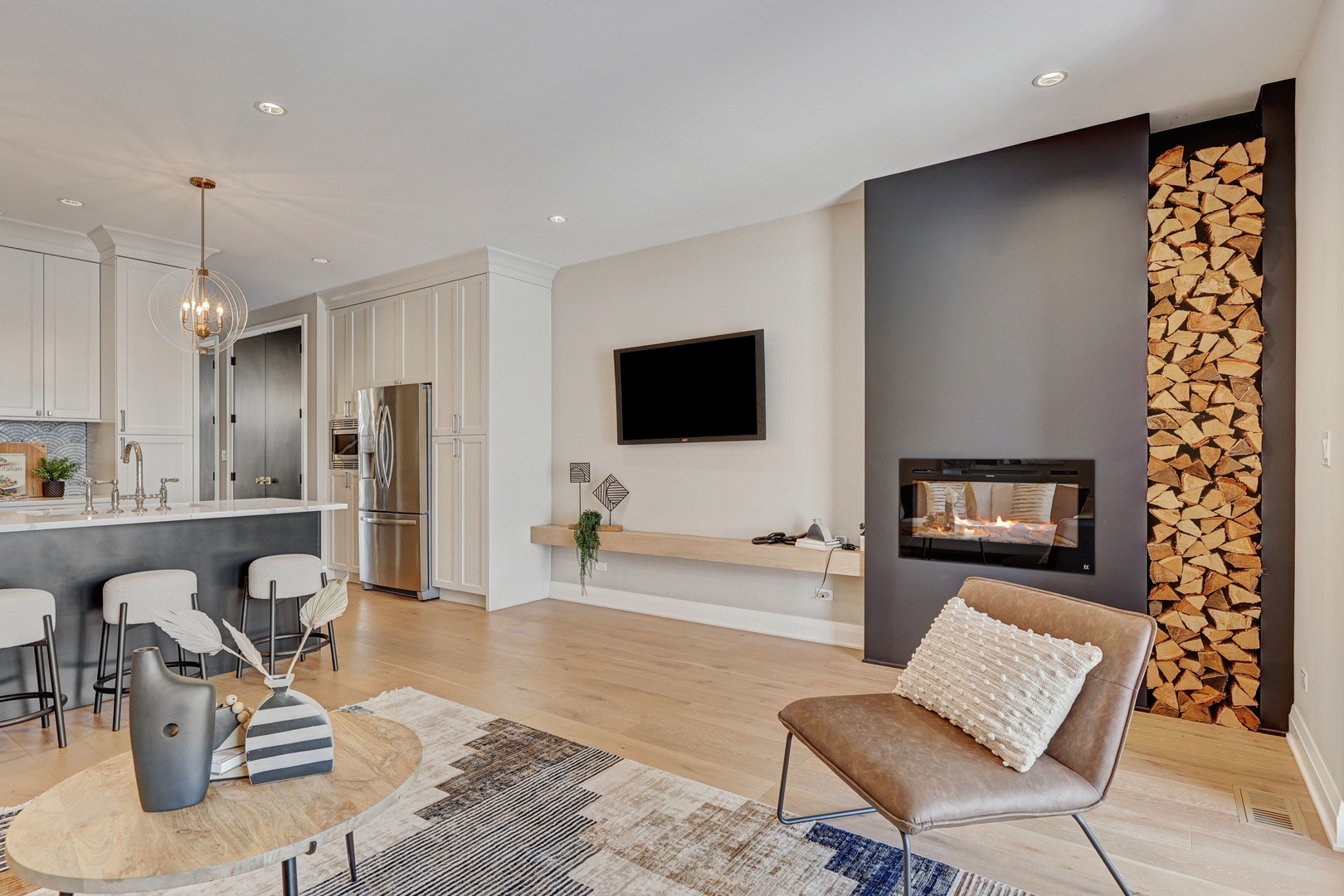 3406 North Keating Avenue Chicago, IL 60641 - Photo 7 of 30 a living room with furniture and a flat screen tv