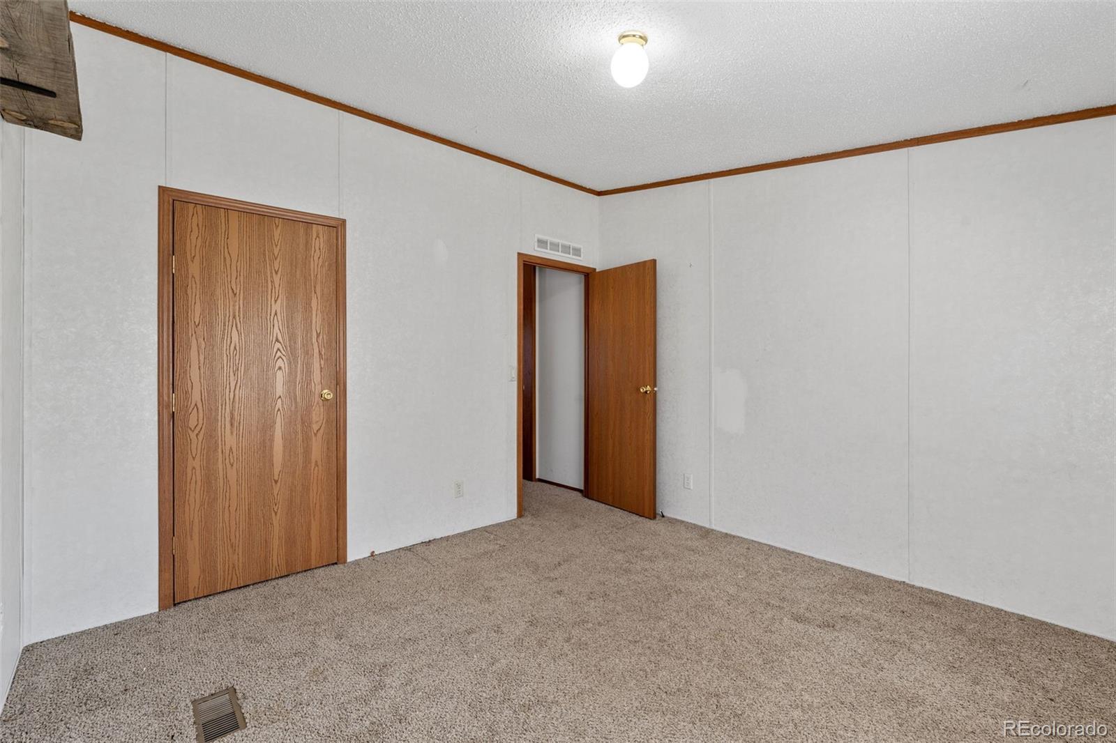 1711 Witcher Mtn. Road Guffey, CO 80820 - Photo 25 of 41 a view of an empty room