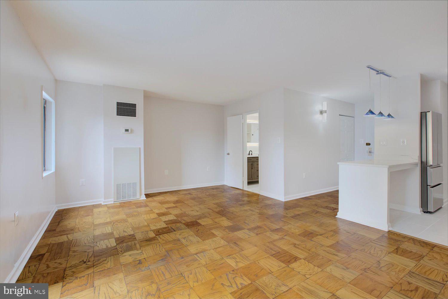 1718 P Street Northwest, Unit 411 Washington, DC 20036 - Photo 12 of 24 a view of a big room with a fireplace