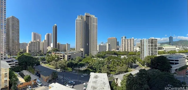 a view of a city with tall buildings