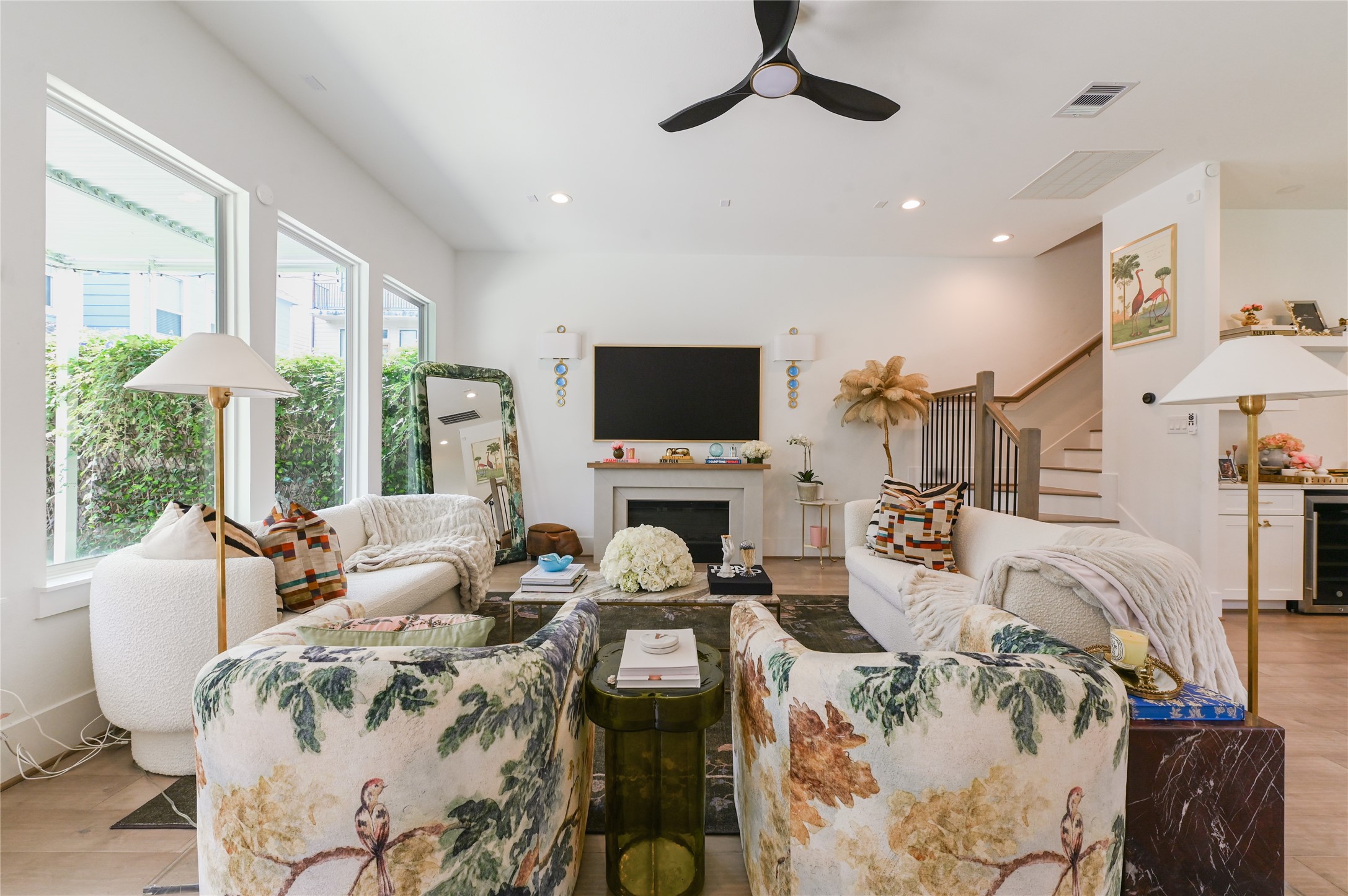 5233 Darling Street Houston, TX 77007 - Photo 11 of 34 a living room with furniture a fireplace and a flat screen tv