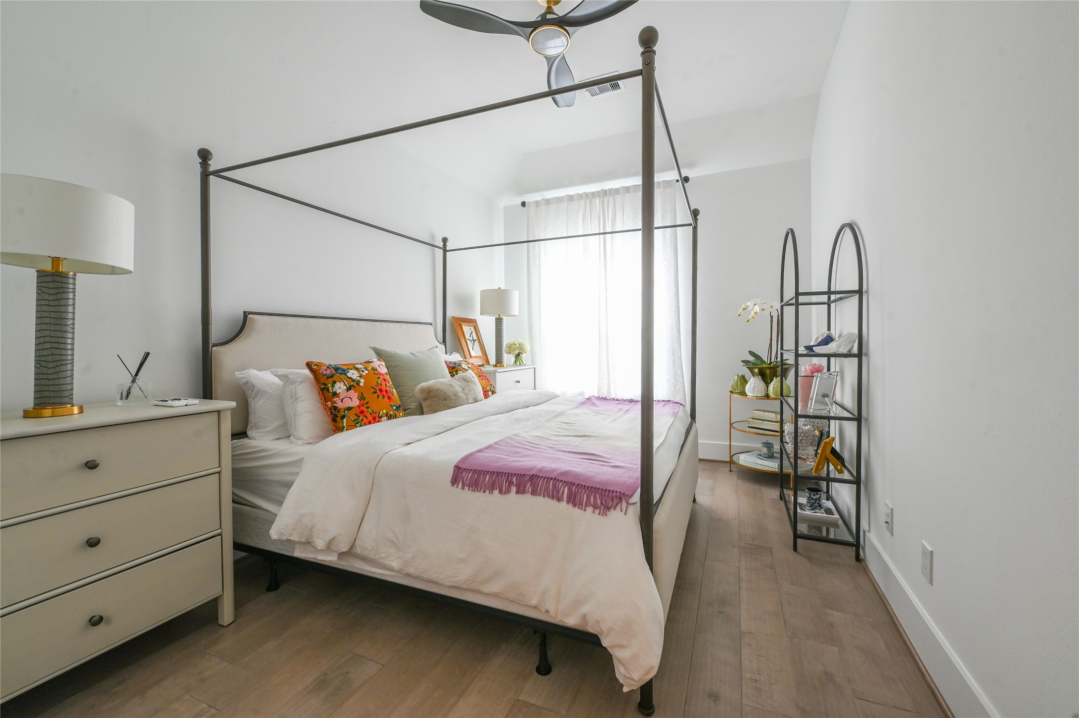 5233 Darling Street Houston, TX 77007 - Photo 27 of 34 a bedroom with a bed and a table