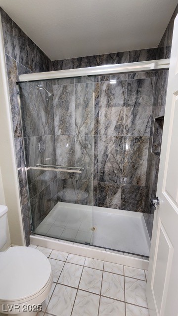 2306 Spring Water Drive Las Vegas, NV 89134 - Photo 15 of 24 Bathroom with toilet and a shower stall